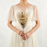 Bridal-style dried bouquet in ivory tones with pampas, wheat and baby's breath